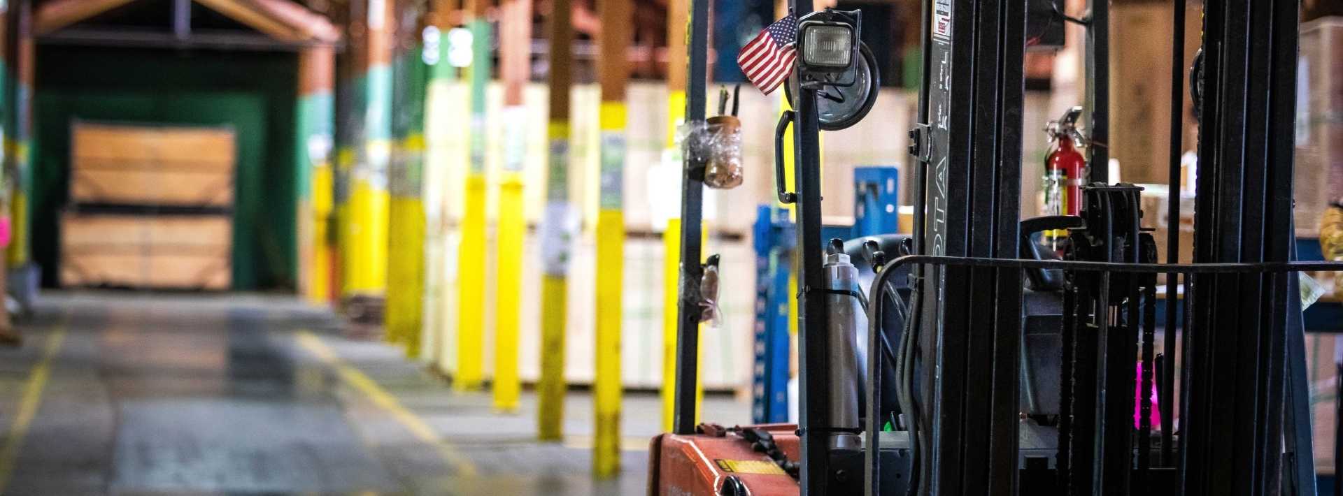 A forklift with small American flag sits in Ventamatic's bath fan warehouse in Mineral Wells, Texas.
